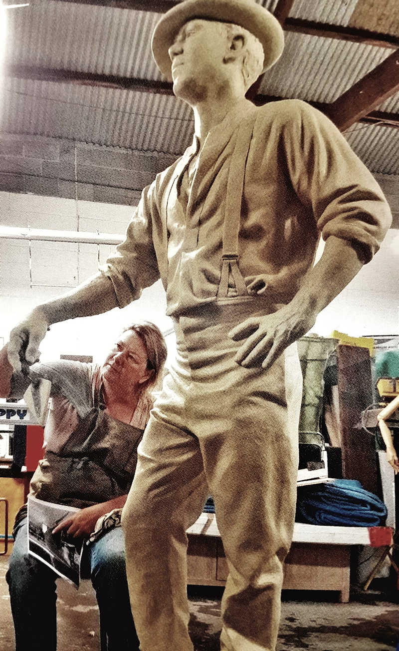 Julie Squires working on bronze stature